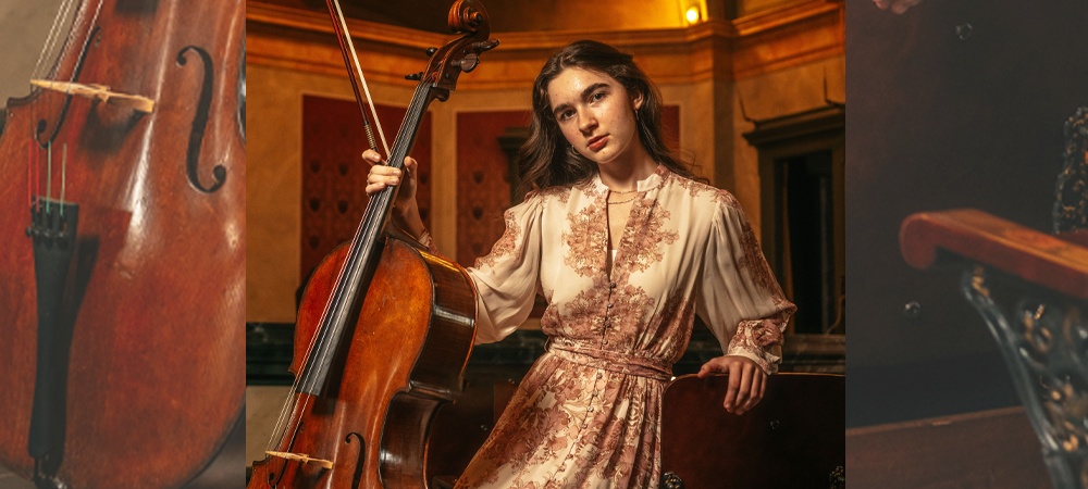 White young woman in floral gown with cello